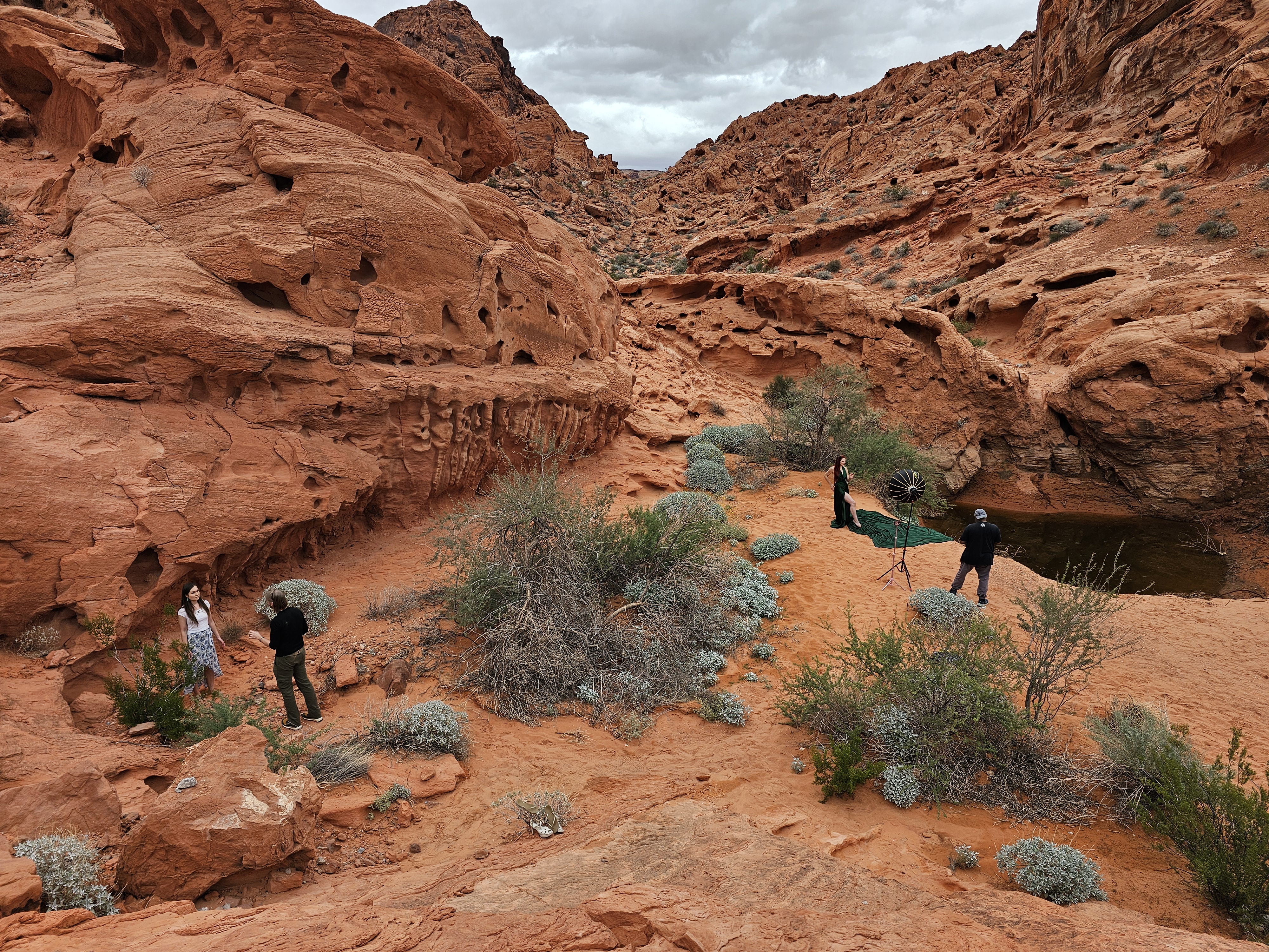 Production crew in red rock desert canyon