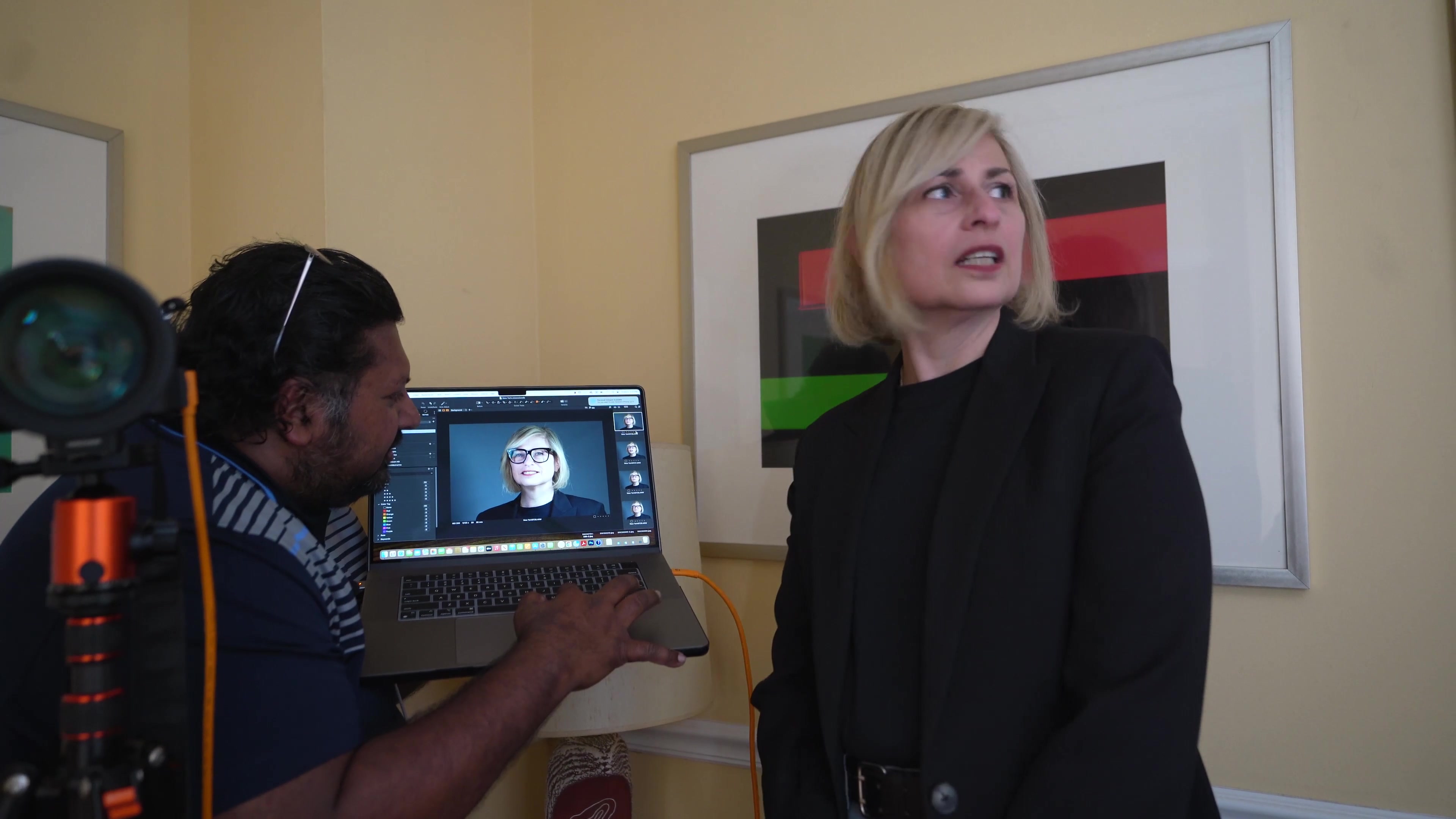 Behind the scenes — reviewing client headshots on location in New York